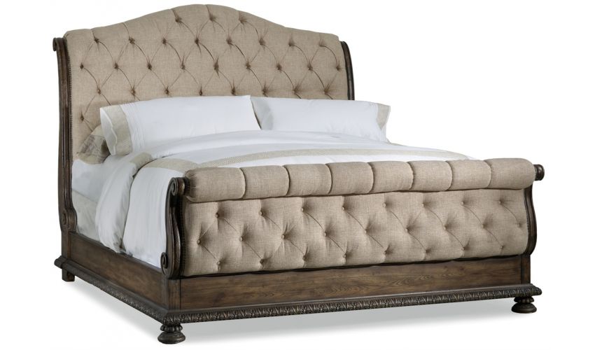 Tufted sleigh bed. Luxury furniture.