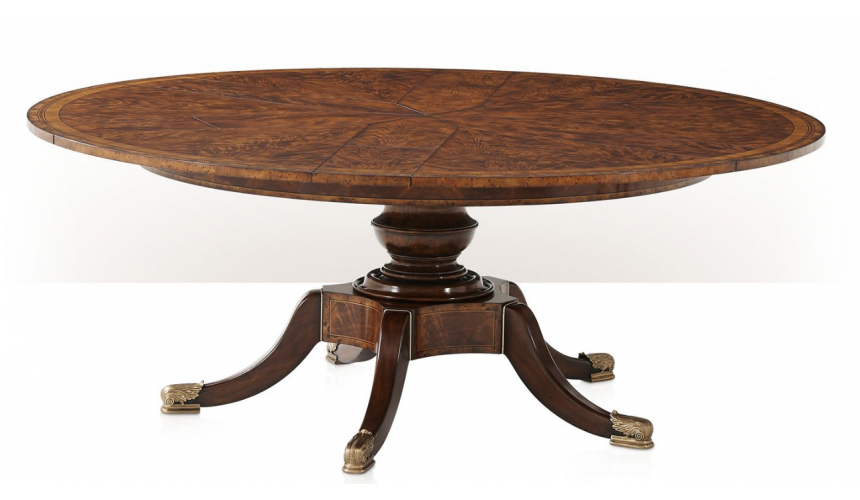 Dining Tables Circular extending mahogany dining table.