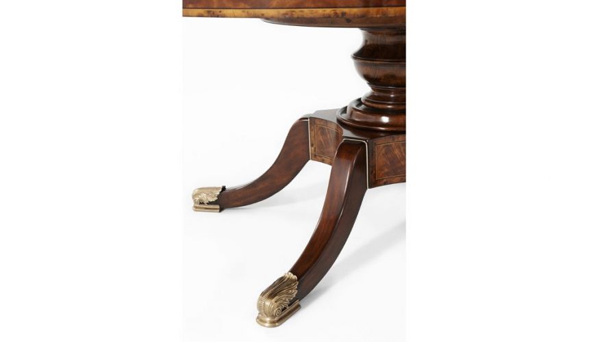 Dining Tables Circular extending mahogany dining table.