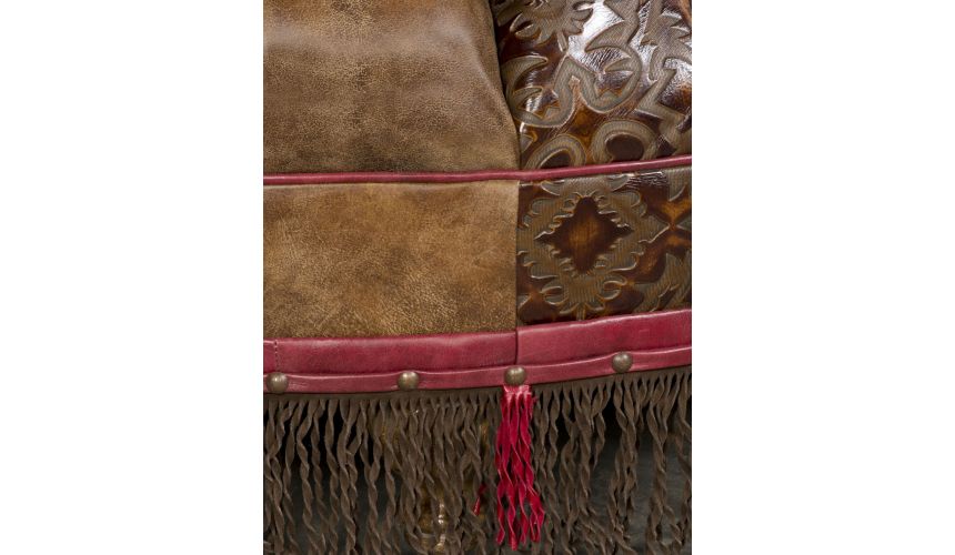 OTTOMANS Round leather ottoman with embossed leather and fringed detail