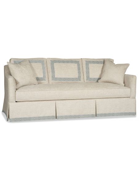 skirted sofa with beautiful detailing