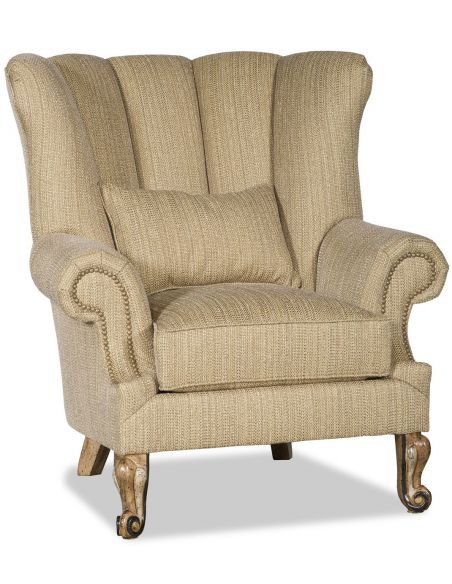 Bisque colored wing backed chair