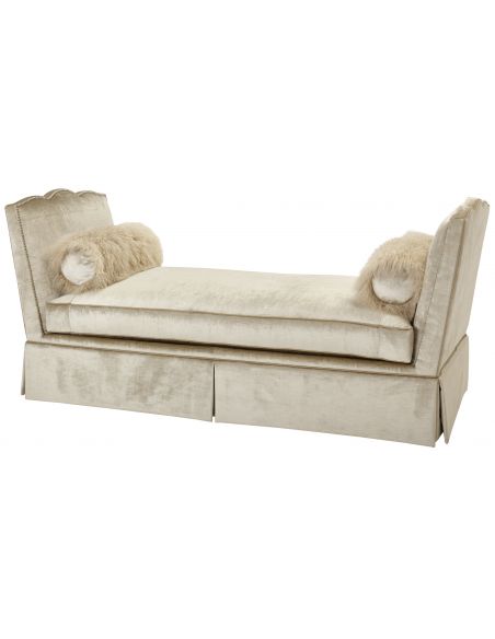 Elegant chaise with faux-fur accent pillows