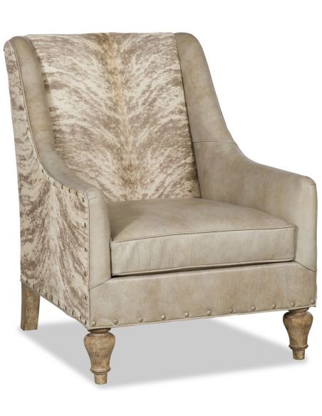 Elegant armchairwith hair on hide accents