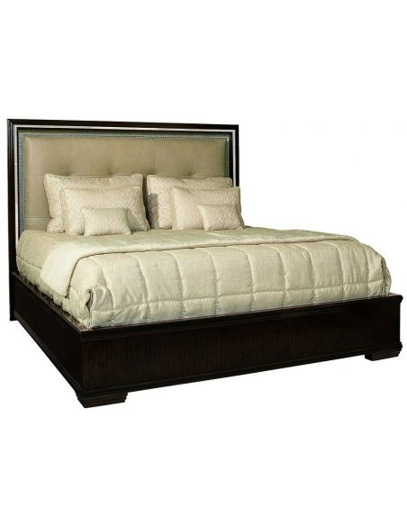 Grand bed with luxurious tufted leather headboard