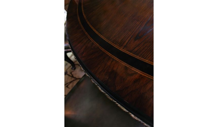 Dining Tables Round dining table with intricate inlay design