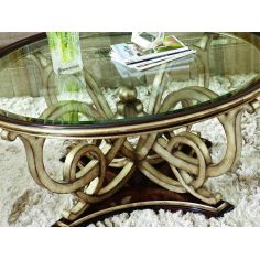 Dining Tables Glass topped dining table with intricate hand carved base. 2