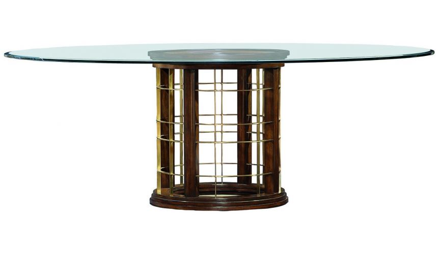 Dining Tables Glass topped dinning table with pedestal base.