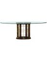 Dining Tables Glass topped dinning table with pedestal base.