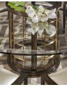Dining Tables Glass topped dinning table with pedestal base.