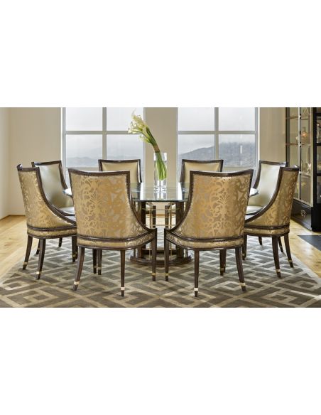 Dining Tables Glass topped dinning table with pedestal base.