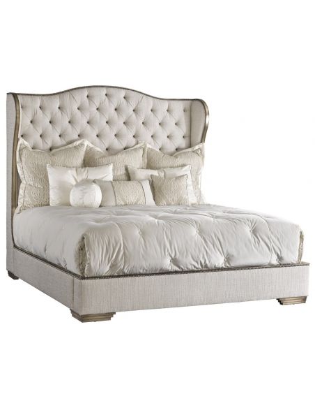 Bed with tufted headboard in a elegant platinum linen