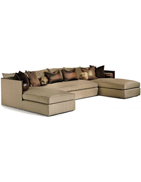 Modern sectional with nailhead trim and leather details