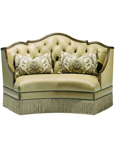 Leather settee with wood trim and chic fringed skirt