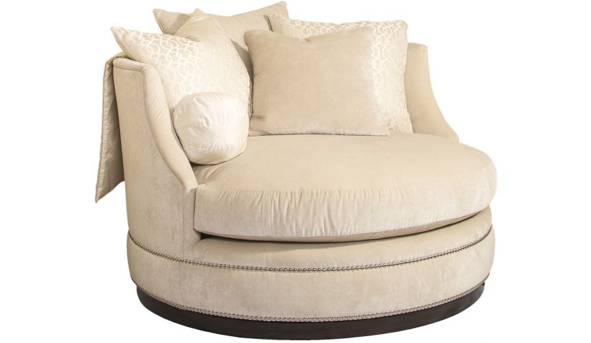 SETTEES, CHAISE, BENCHES Ivory rounded barrel style chair with nailhead trim