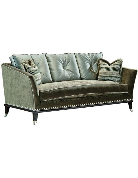 Modern style sofa with contrasting tufted back cushions