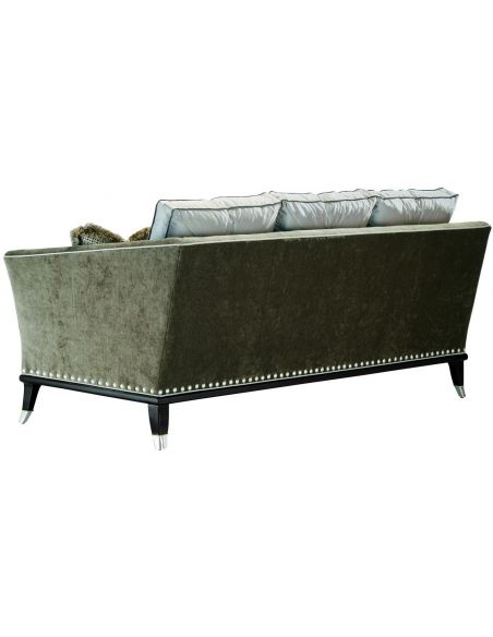 Modern style sofa with contrasting tufted back cushions