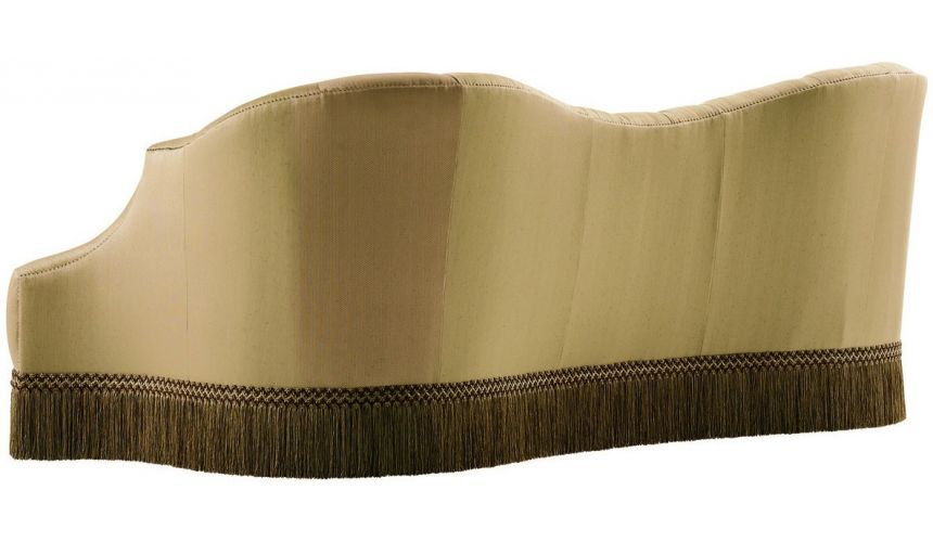 SOFA, COUCH & LOVESEAT Bisque colored sofa with beautiful curved lines and fringed skirt