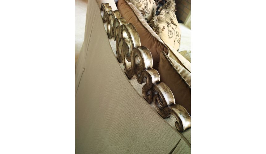 SOFA, COUCH & LOVESEAT Sofa in a lux cream fabric with hand carved wooden details