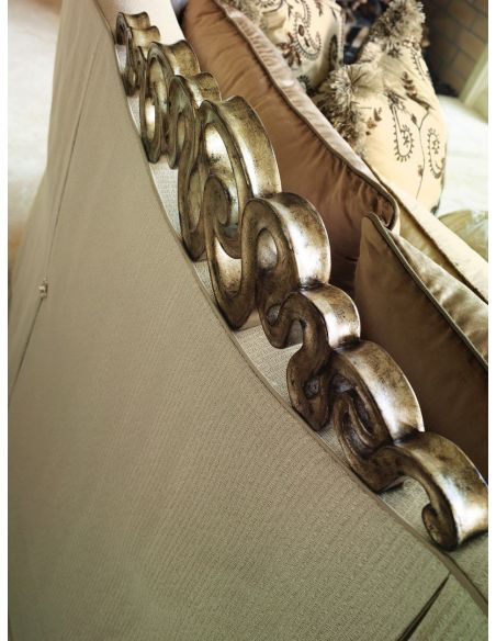 SOFA, COUCH & LOVESEAT Sofa in a lux cream fabric with hand carved wooden details
