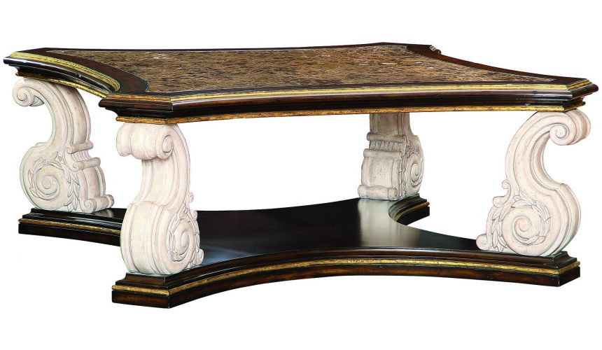 Coffee Tables Cocktail table with intricately carved scrolled legs