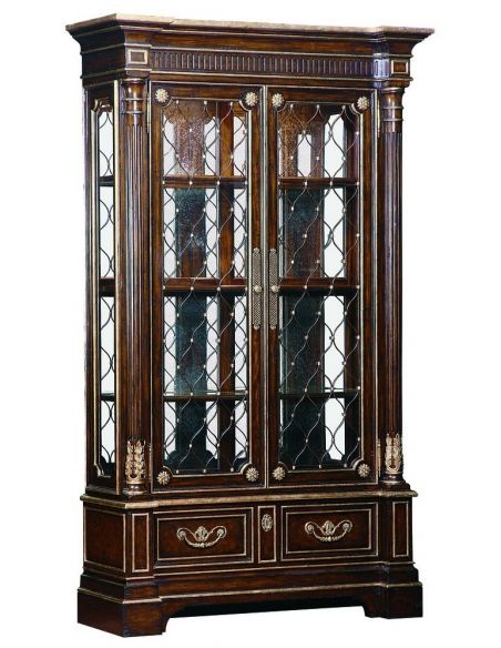 Old world display case with glass doors adorned with metal lattice detail