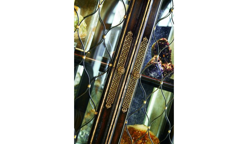 Breakfronts & China Cabinets Old world display case with glass doors adorned with metal lattice detail