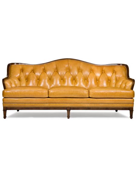Tufted goldenrod leather sofa