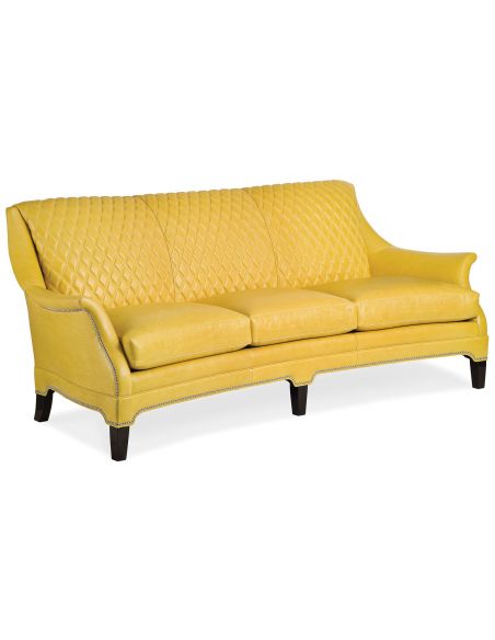 Quilted golden yellow leather sofa
