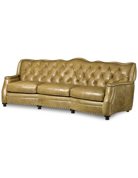 Tufted tan leather sofa
