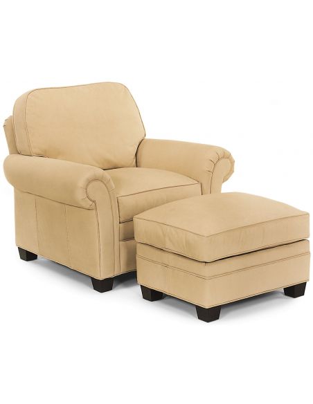 Cream leather armchair and ottoman