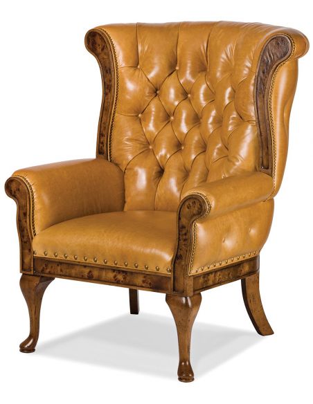 Tufted leather wing backed chair