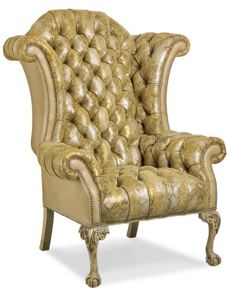 Tufted wing backed leather chair