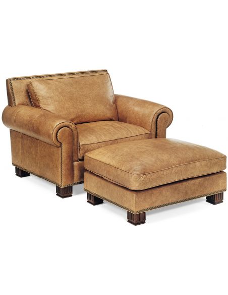 Leather armchair and matching ottoman 
