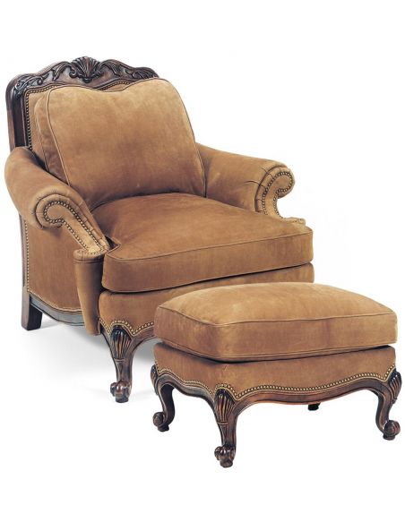 Armchair and ottoman with carved details