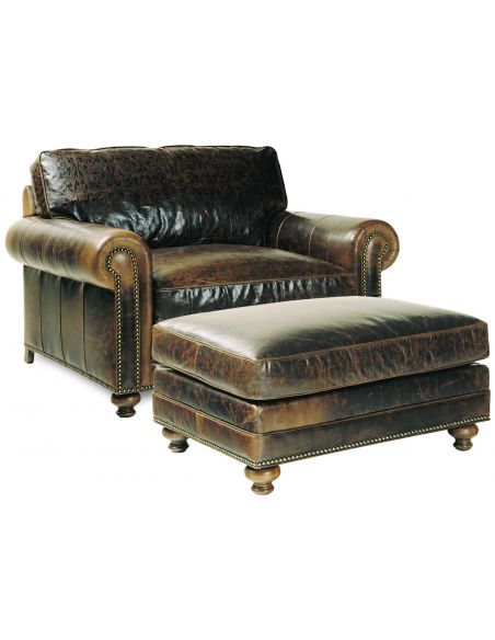 Rugged leather armchair and ottoman