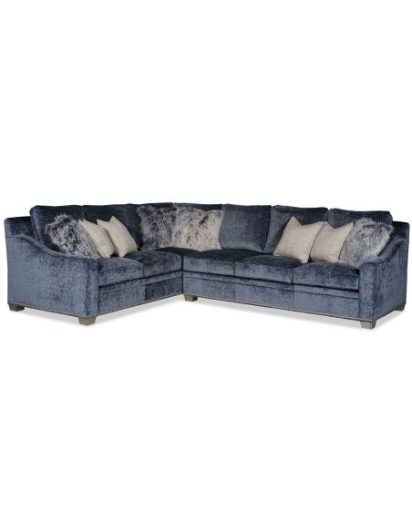 Sectional sofa covered in midnight blue fabric