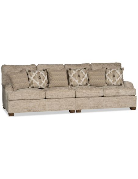 Sectional sofa covered in a warm oatmeal colored fabric