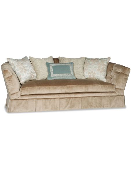 Sofa covered in a luxurious cream colored fabric