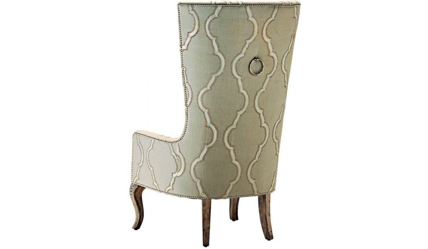 High back armchair in a chic ivory fabric