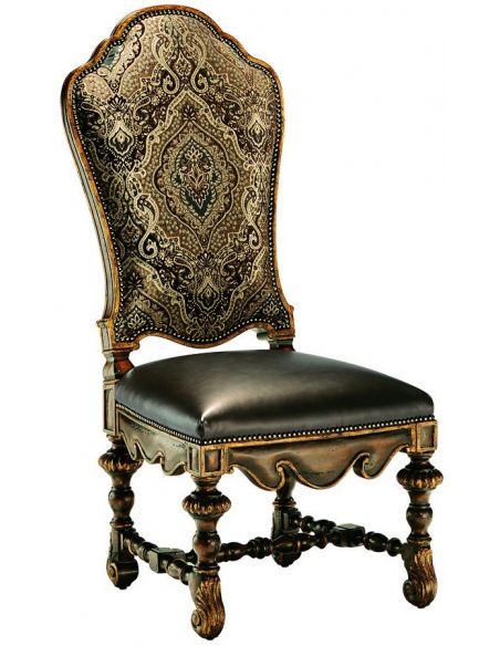 Dining room chair covered in a combination of leather and printed fabrics