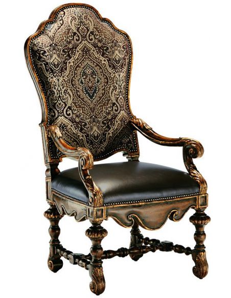 Dining room chair with arms covered in a combination of leather and printed fabric