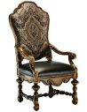 Dining Chairs Dining room chair with arms covered in a combination of leather and printed fabric