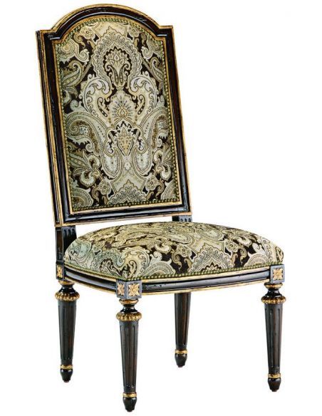 Dining room chair with rich printed fabric and carved wooden legs