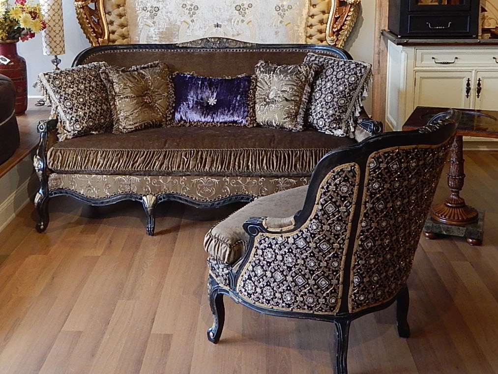 Luxury Leather & Upholstered Furniture 22 Victorian style sofa with a black and gold color theme.