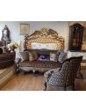 Luxury Leather & Upholstered Furniture 22 Victorian style sofa with a black and gold color theme.
