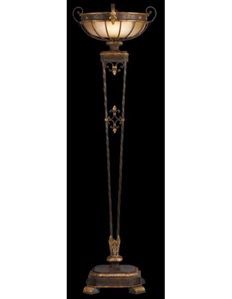 Torchiere of antiqued iron and gold leaf finish