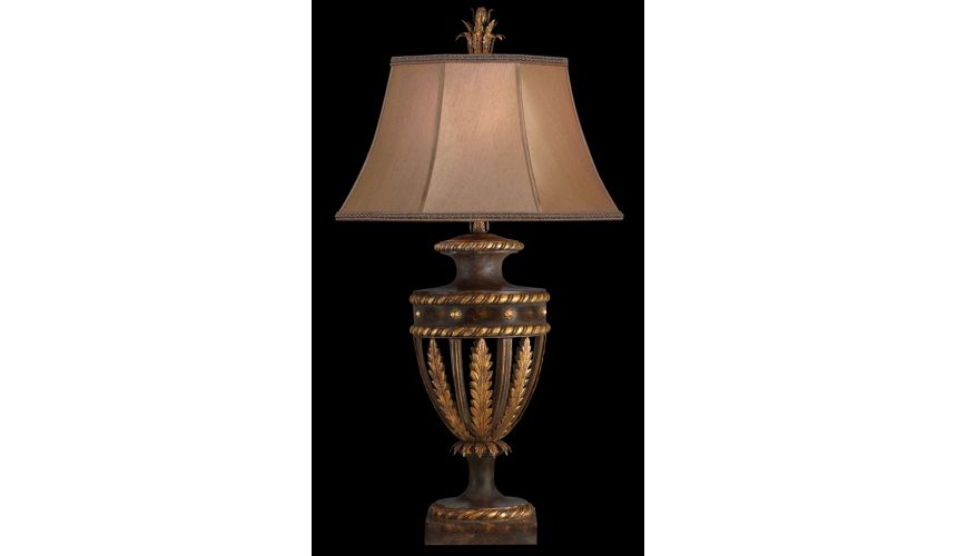 Lighting Table lamp in antiqued iron and gold leaf finish