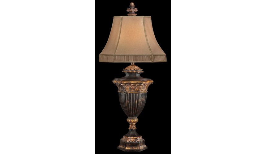 Lighting Table lamp in warm finish with gold leaf accents