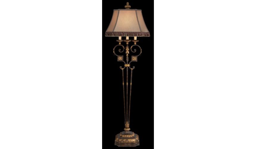 Lighting Floor lamp of antiqued iron and warm gold leaf finish